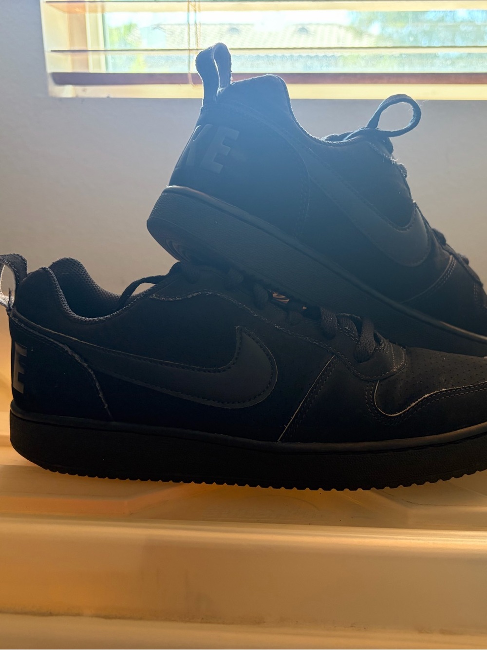 Nike Black Low-Top Sneakers with Swoosh Detail